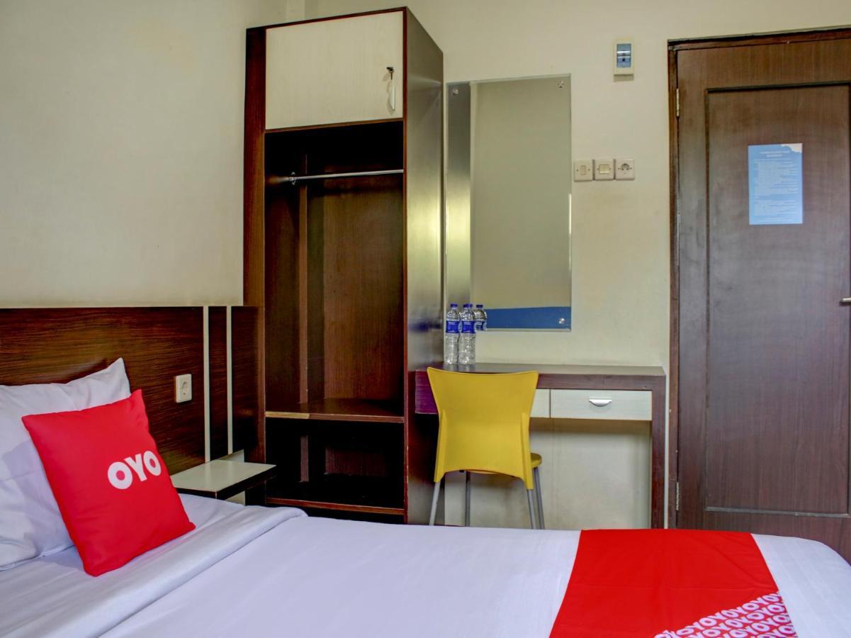 Oyo 90162 Remboelan Guest House Sungai Lutus Exteriör bild