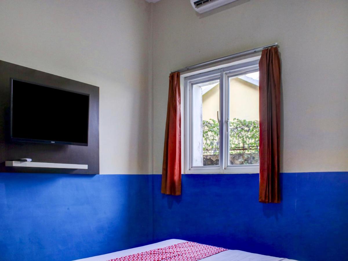 Oyo 90162 Remboelan Guest House Sungai Lutus Exteriör bild