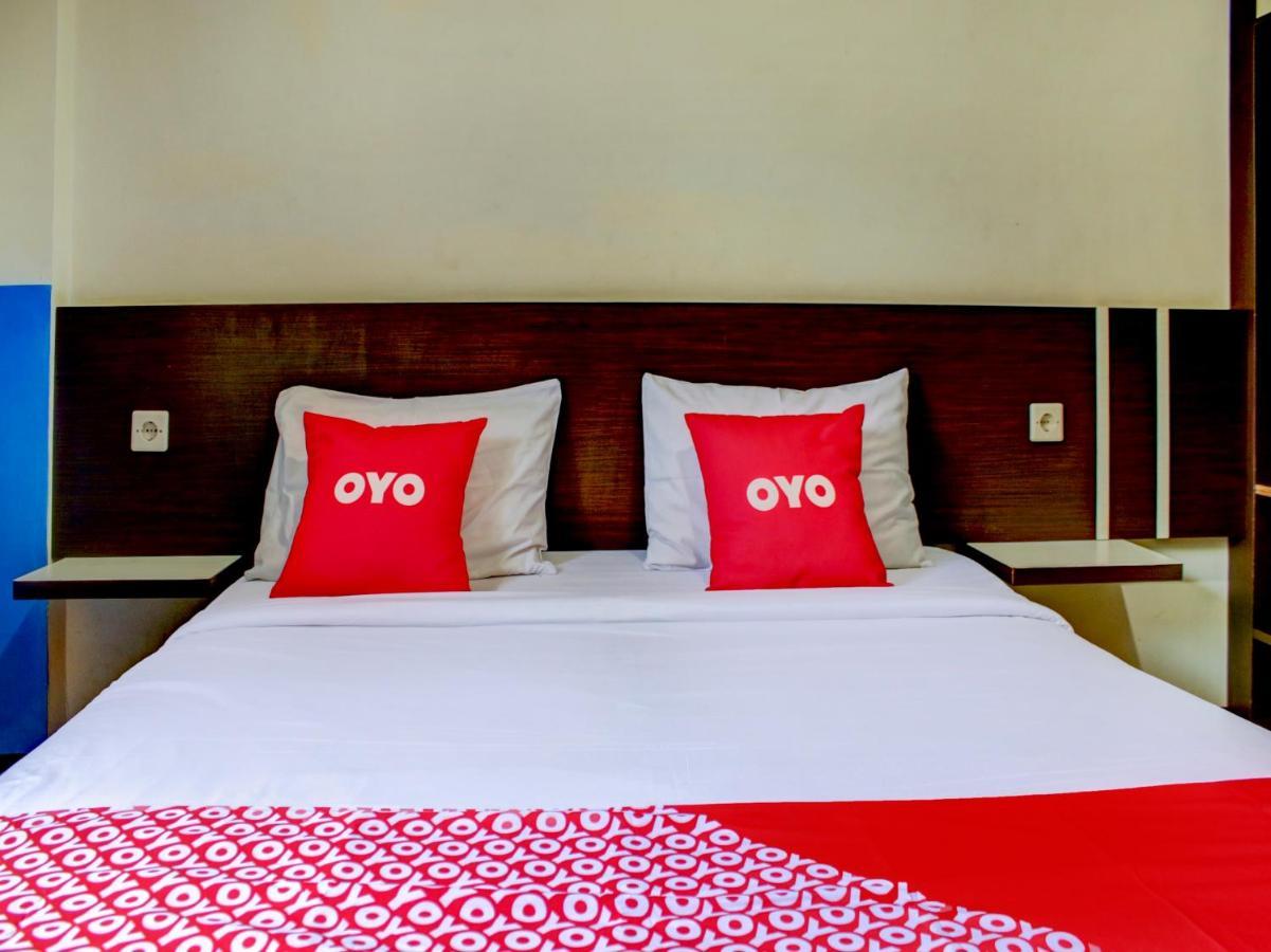 Oyo 90162 Remboelan Guest House Sungai Lutus Exteriör bild